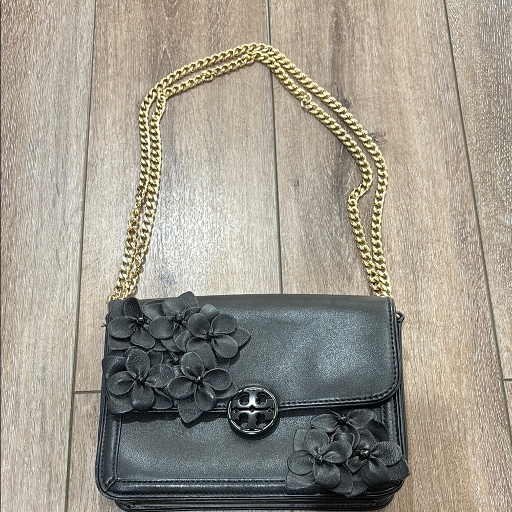 Tory Burch Black and Gold Crossbody Bag with Floral Embellishments